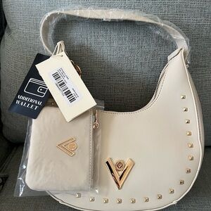 Elegant Cream Handbag with Gold Accents